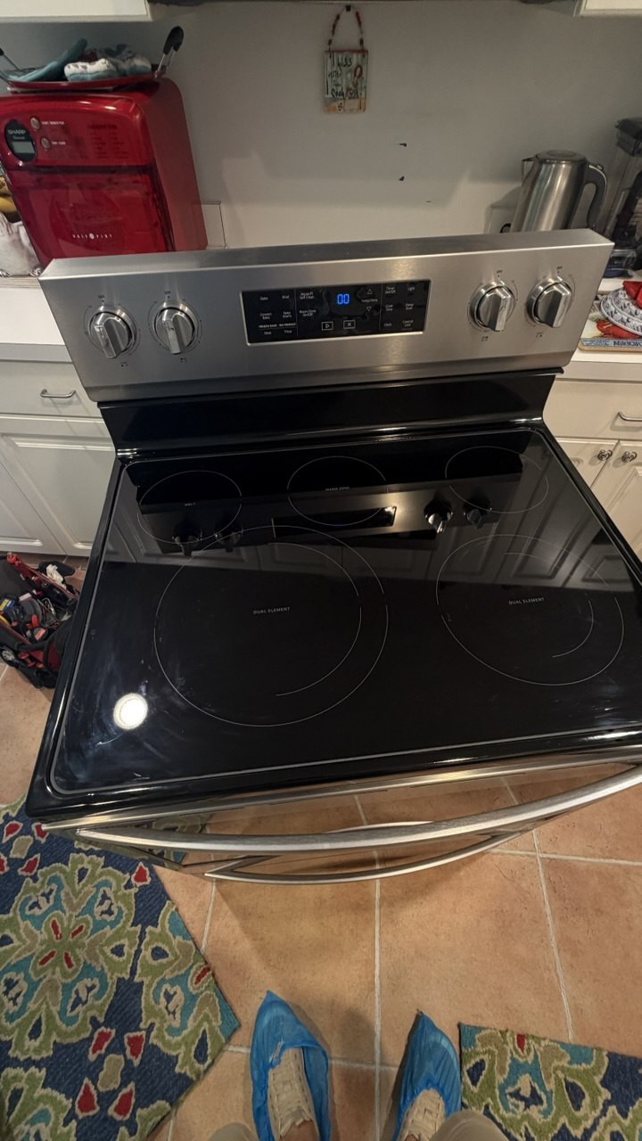 Electric range serviced in a Naples kitchen