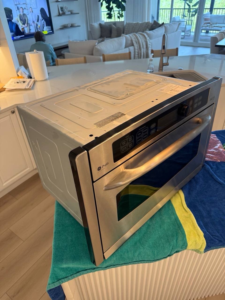 Oven repair in progress in a Naples home