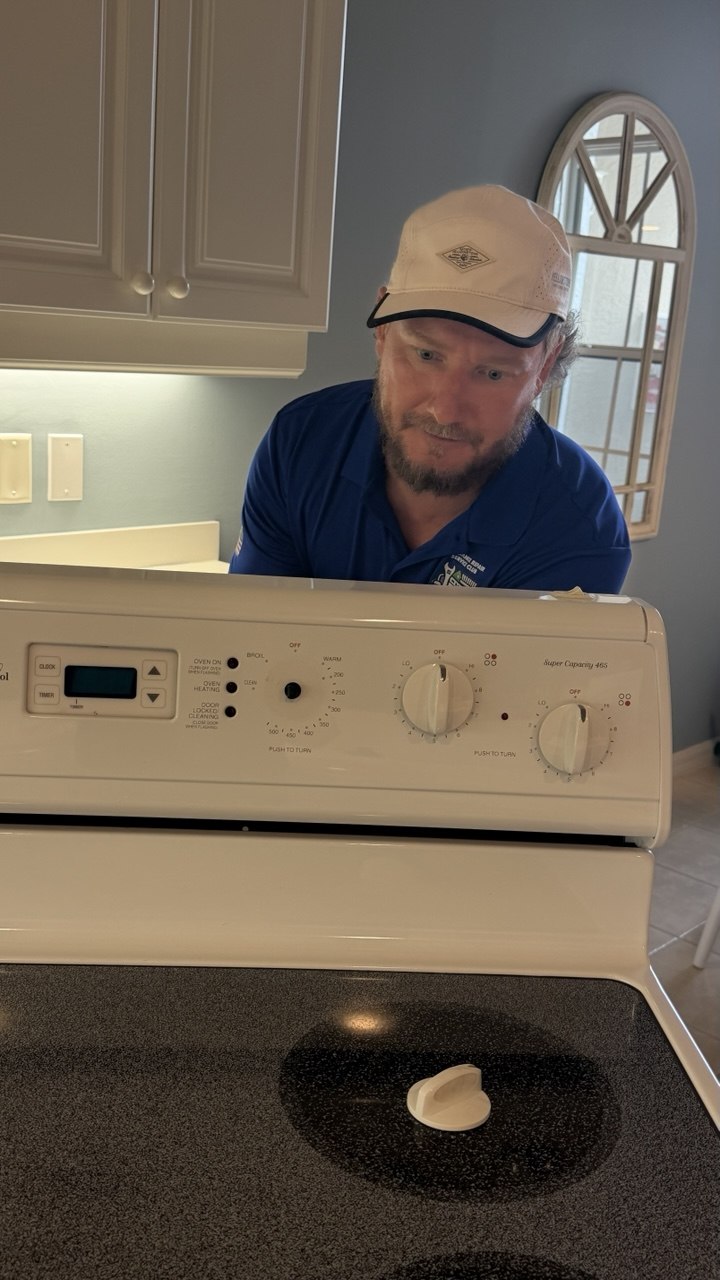Oven repair in progress in a Naples home