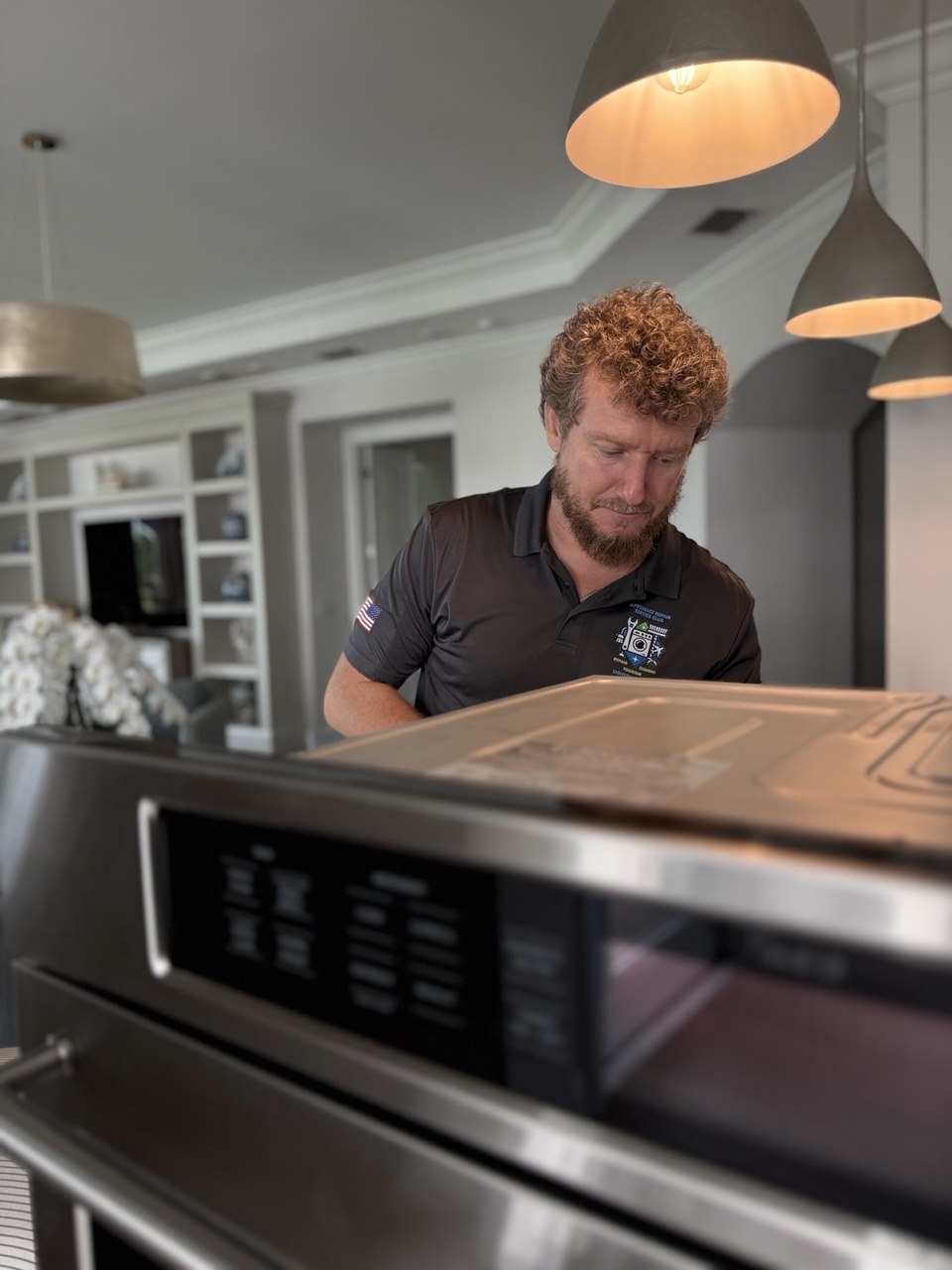 Oven repair in progress in a Naples home